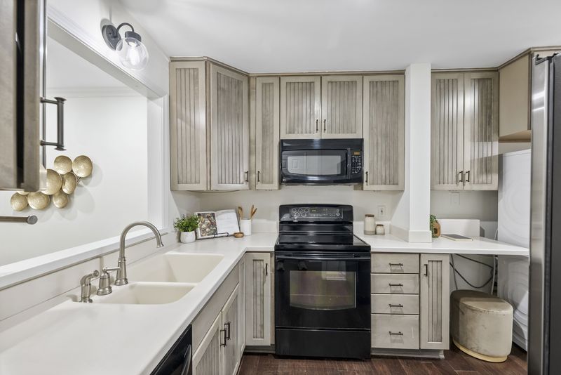 Kitchen, second view with the sink and pass-through window
